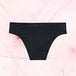 Culotte noire du Pack Sexy baby, offrant trois culottes menstruelles Brazilian Light pour un confort discret et féminin.